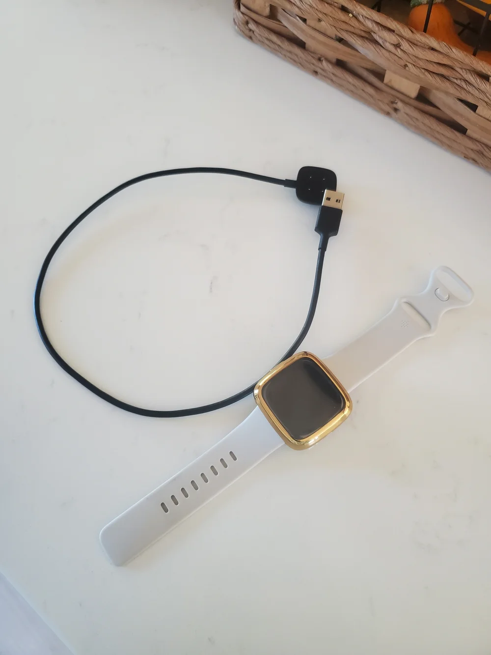 Fitbit Sense 2 smartwatch With Charger And Gold Screen Protector.